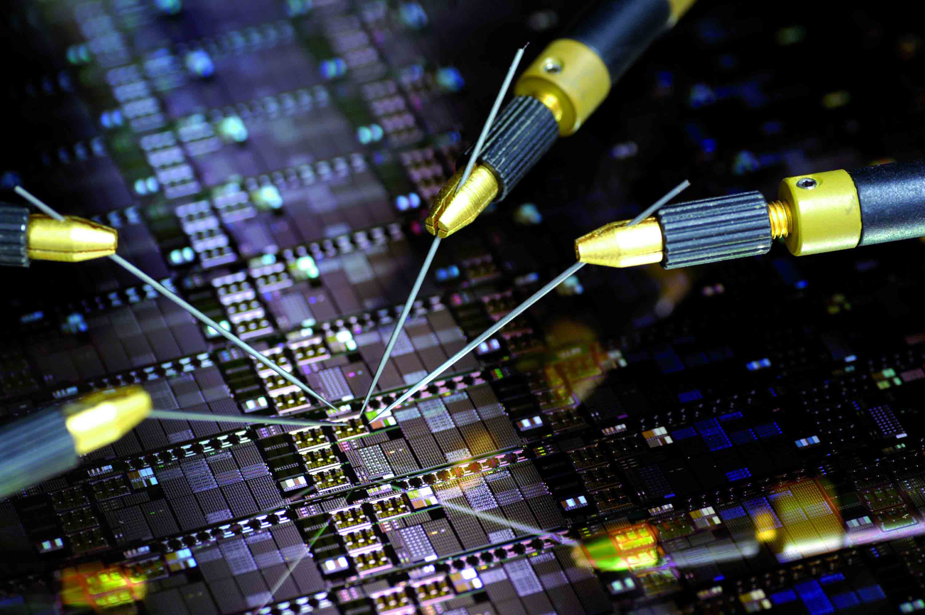 Test needles contact the circuits on a CMOS wafer 