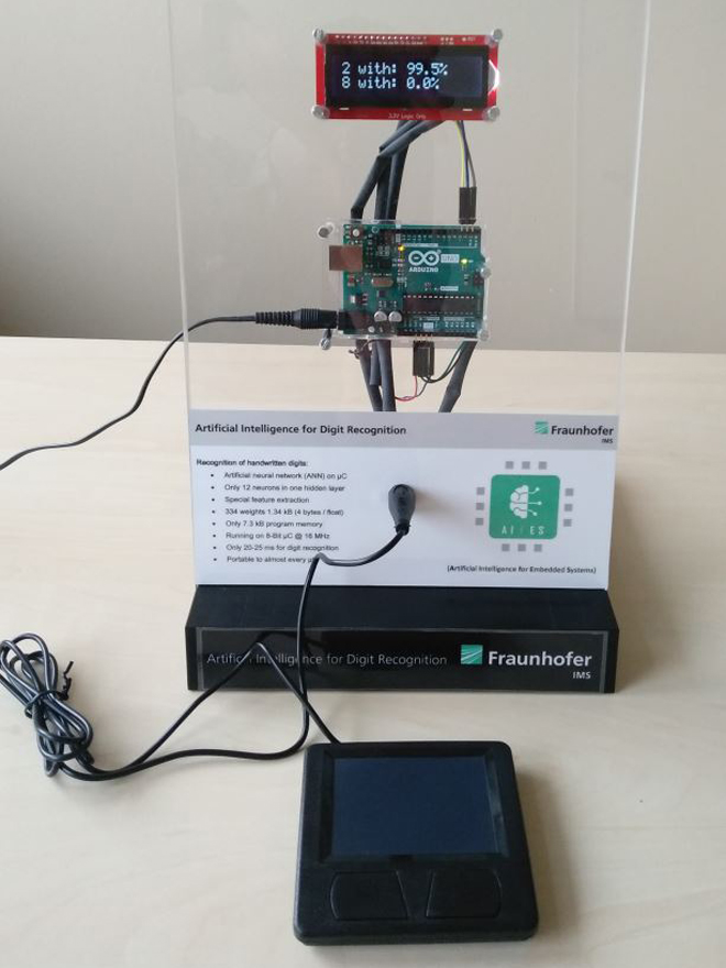 Image of the complete demonstrator with the touchpad connected to the Arduino UNO and the digital readout of detected values.